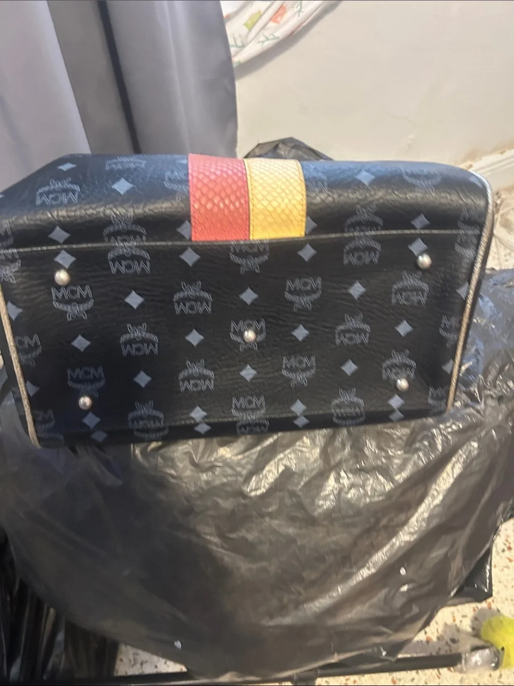 Lion 🦁 Black Logo Satchel with Red and Yellow Stripe and Gold Handles
